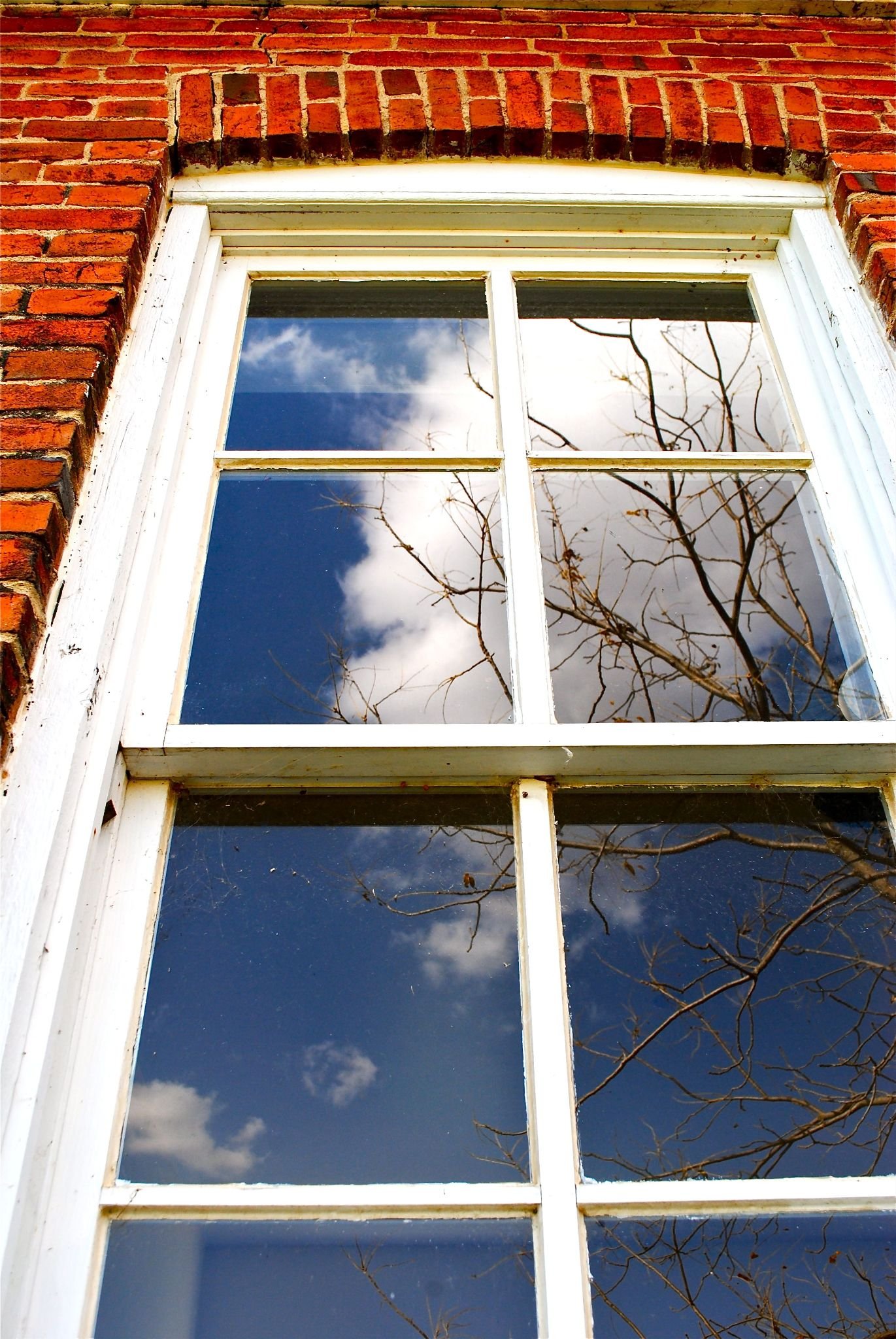Clean windows on a brick building